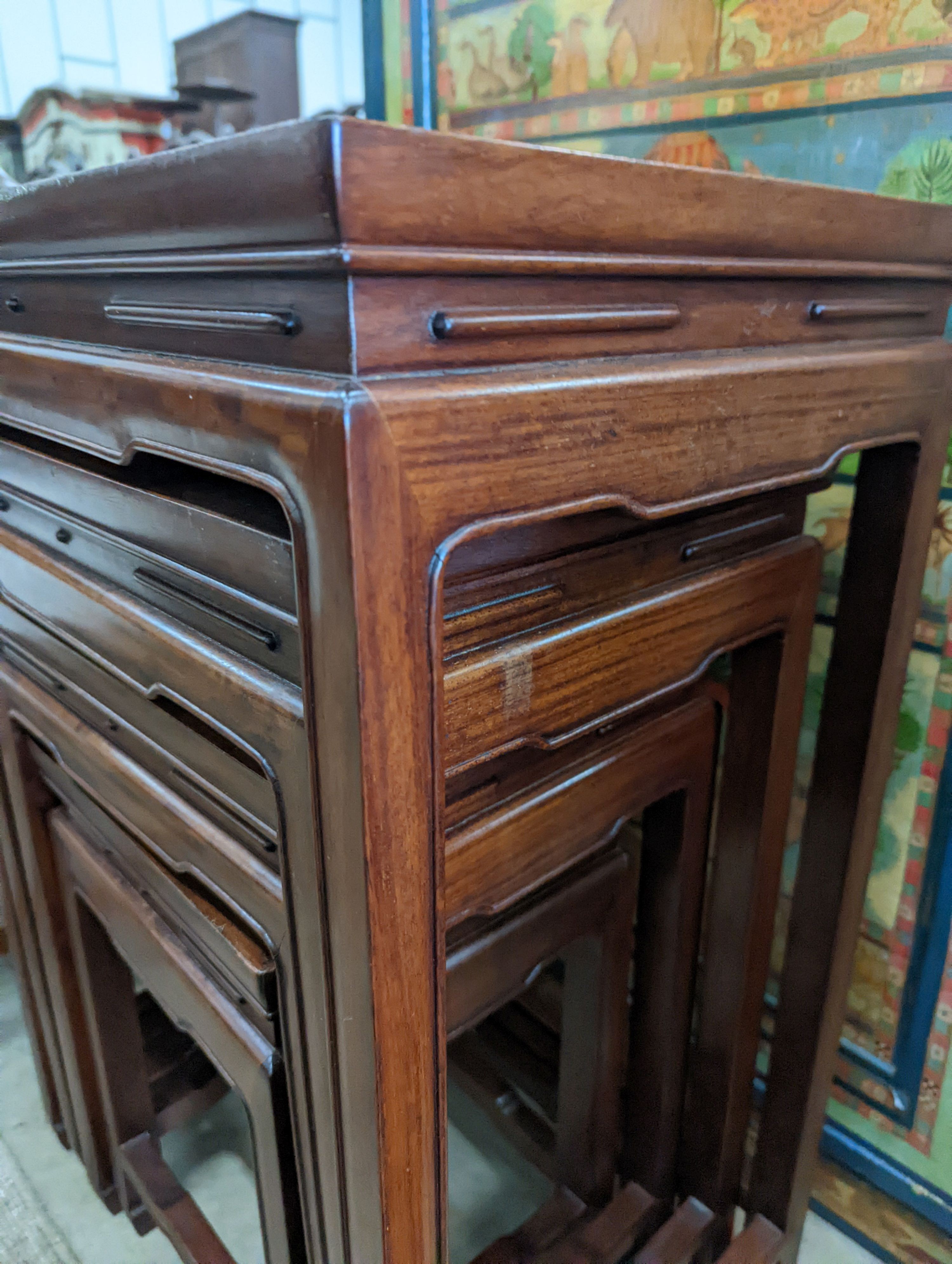 A quartetto of rectangular Chinese hardwood tea tables, width 49cm, depth 34cm, height 70cm